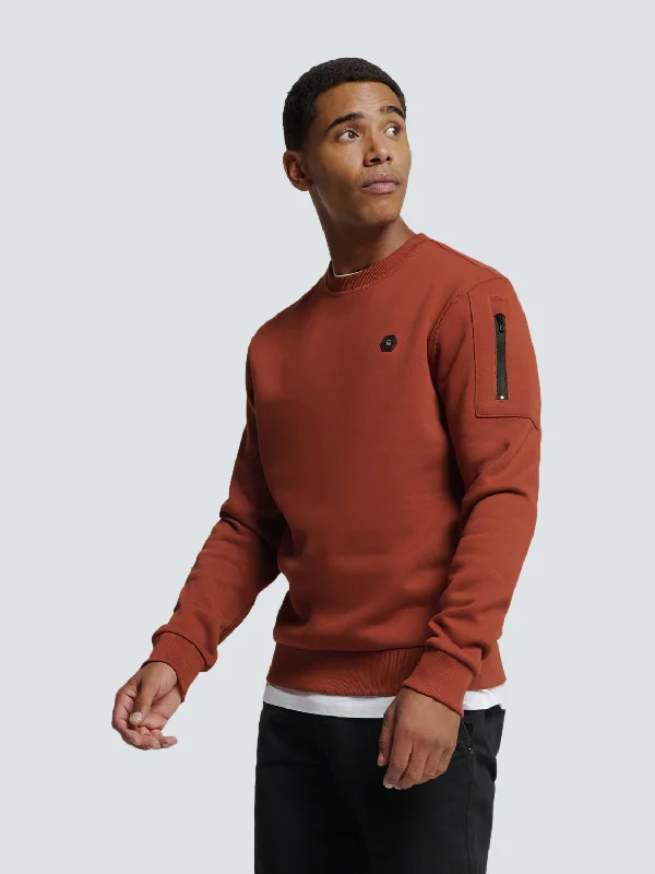 Sweater with Rubber Logo Patch and Zippered Arm Pocket | Rusty